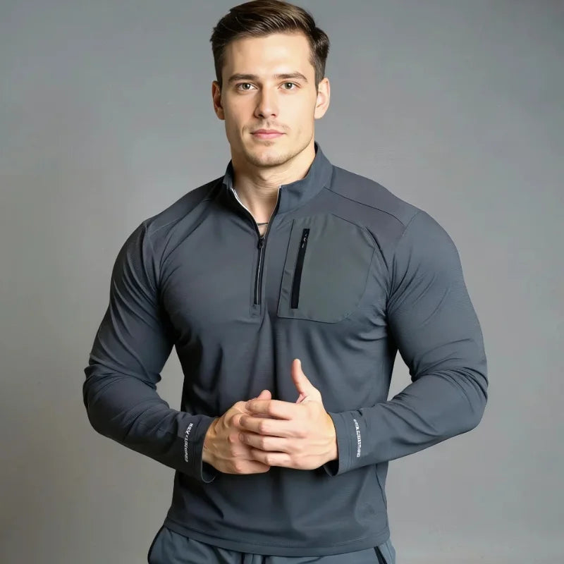 Haut Demi-zip gris avec poche contrastante