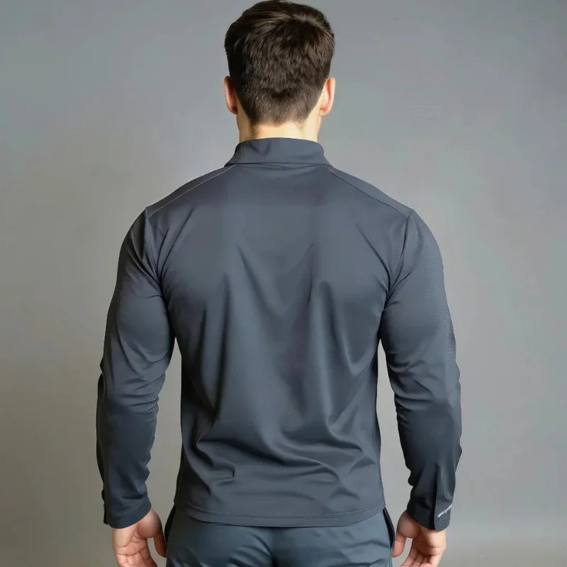 Haut Demi-zip gris avec poche contrastante