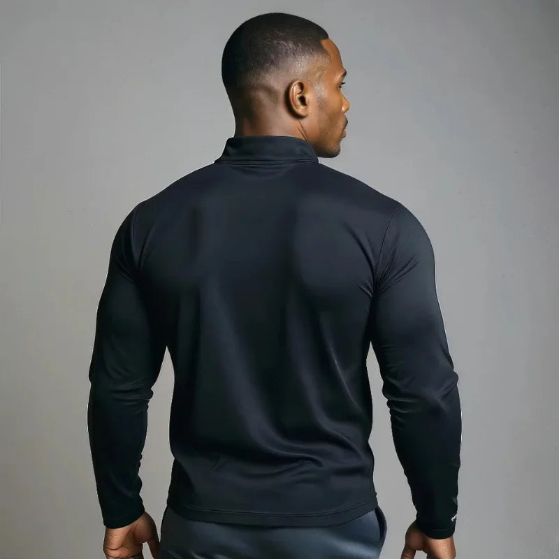 Haut Demi-zip noir avec poche contrastante